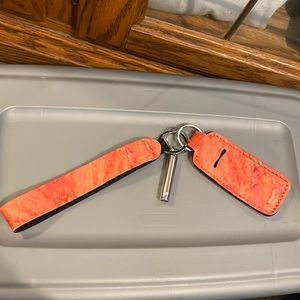 Chapstick holder with safety whistle